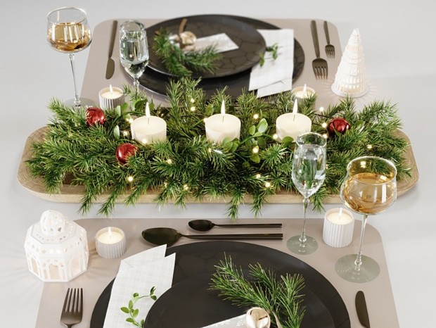 圣诞餐桌布置，餐盘，蜡烛，松树叶